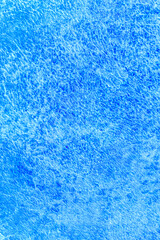 Beautiful blue texture abstract wall background, ribbed surface texture with copy space, unusual spotty surface background