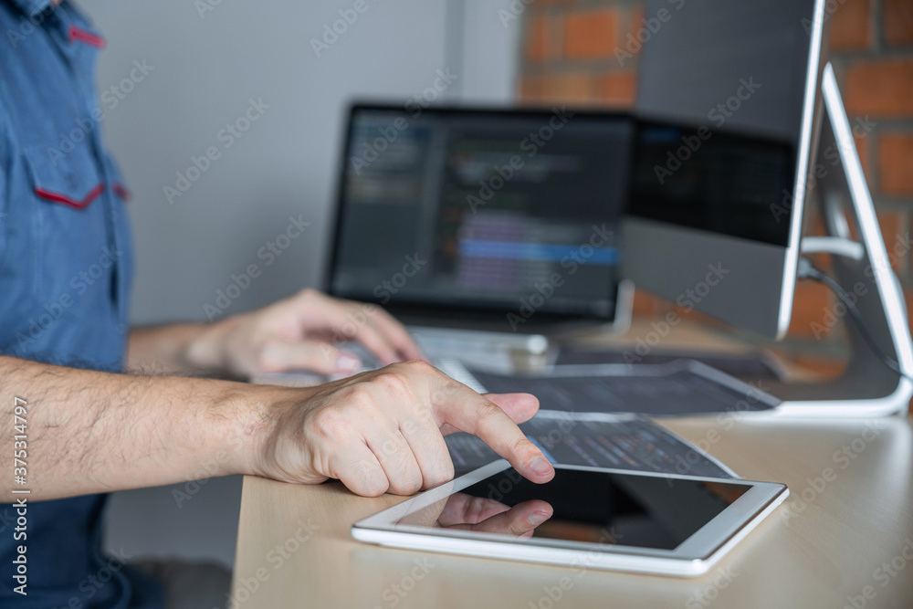 Aufkleber Young Professional programmer working at developing programming and website working in a software develop company office, writing codes and typing data code, Programming with HTML, PHP and javascript