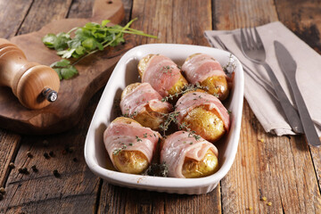 potato cooked with bacon and rosemary