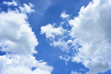 The blue sky with beautiful clouds on a sunny day.