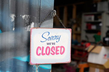 windows vintage steel shop sign saying sorry we are closed