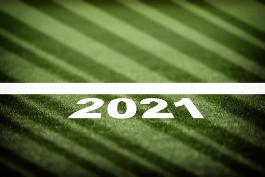 New Year 2021 And White Starting Line On Green Grasses Background