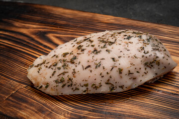 Fresh sous vide chicken breast prepared for grilling with seasonings