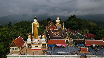 What Phra That Doi Kham literally means "Temple of the Golden Mountain," this temple is situated on Doi Kham hill, surrounded by beautiful jungle covered mountains in Chiang Mai. This ancient temple w
