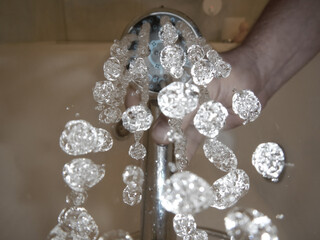 Close up on a Shower Head with Water Drops.
