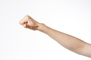 female hand showing thumbs up.