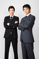 young businessmen looking at camera