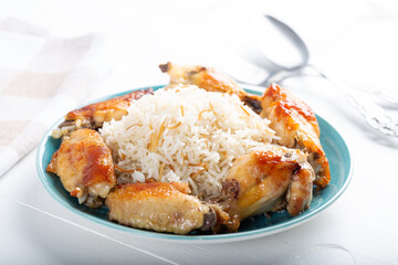 Grilled chicken wings with basmati rice. 