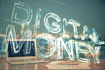 Double exposure of blockchain theme hologram and table with computer background. Concept of bitcoin crypto currency.