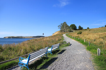 A resting place along the hiking trail on steep coast of the holiday destination 