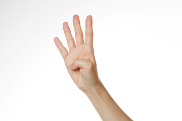 a woman's hand with four fingers spread out.
