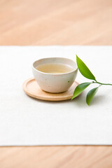 cup of tea with leaf