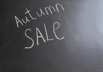 The inscription on the board "Autumn sale". Copy space.