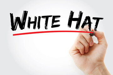 Fototapeta premium White Hat text with marker, technology concept background