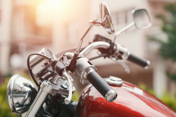 Closeup of mirrors, speed dial and gripping of chopper motorbike.