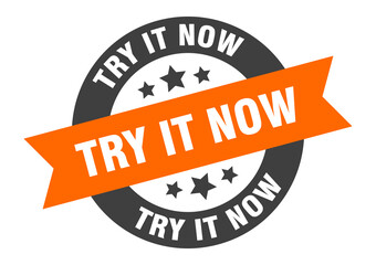 Fototapeta premium try it now sign. round ribbon sticker. isolated tag