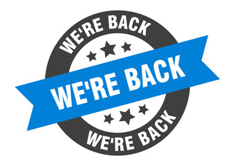 we're back sign. round ribbon sticker. isolated tag