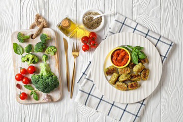 baked broccoli totsbaked broccoli tots on a plate, top view