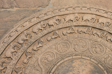 Detail of Sandakada pahana, also known as Moon-stone, is a unique feature of the Sinhalese architecture of ancient Sri Lanka