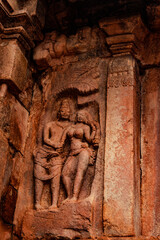 sculptures of hindu gods on facade of 7th century temple carved walls in Pattadakal