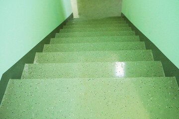 Staircase with stone steps inside the building.