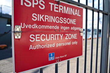 ISPS security sign on the port area, security zone for authorized personnel only.