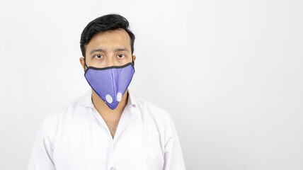 a male medical professional in white coat and mask in white background. concept image for viral infection precaution