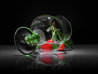 glass of water with cherries