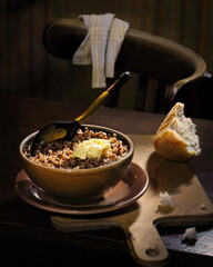 Buckwheat porridge in a clay plate.