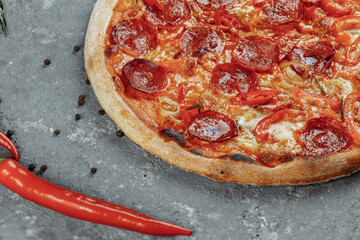 Thinly sliced pepperoni is a popular pizza topping in American-style pizzerias