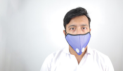 a male medical professional in white coat and mask in white background. concept image for viral infection precaution