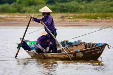Foto op Canvas Visser op de Thu Bon-rivier bij Hoi An © DJ Fotoselect