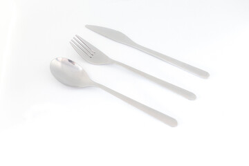 Isolated cutlery set upon a white background
