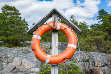 Lifebuoy ring on the coast of of Porkkalanniemi, Kirkkonummi, Finland