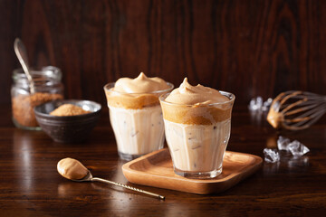 dalgona coffee in glass. trendy Instant coffee whipped with sugar and hot water