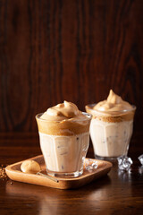 dalgona coffee in glass. trendy Instant coffee whipped with sugar and hot water