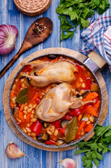 Stewed poultry with vegetables and beans