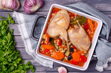 Stewed poultry with vegetables and beans