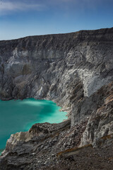 Fototapeta na wymiar Ijen Crater or Kawah Ijen is a volcanic tourism attraction in Indonesia with beautiful landscape