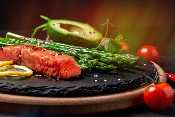 tasty dish of asparagus and avocado with herbs, Food recipe background. Close up