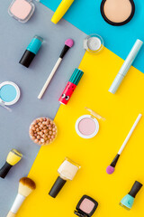 Fototapeta na wymiar Beauty cosmetics and makeup products on colorful background. Flat lay, top view