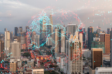 Glowing hologram of Earth planet map on aerial panoramic cityscape of Kuala Lumpur at sunset, Malaysia, Asia. The concept of international business in KL. Multi Exposure.