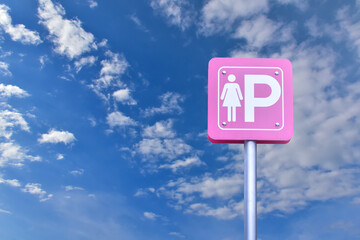 Ladyparking sign on pole on bluesky background.