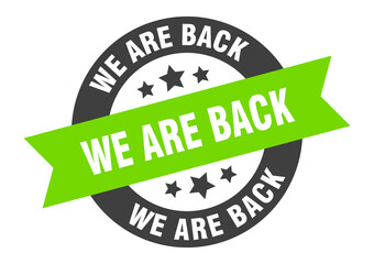 we are back sign. round ribbon sticker. isolated tag