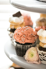 close up of elegant cupcakes on table for event