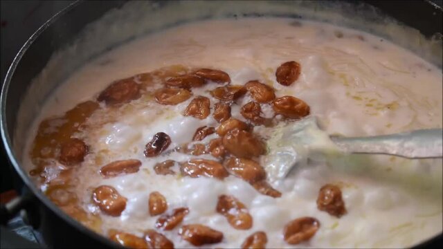 Preparing onam special Payasam with roasted dry fruits on top. Semiya Payasam or Vermicelli Payasam. Payasam is a south Indian dessert most commonly found in Kerala.