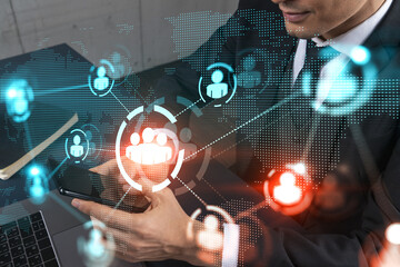 Man in office working with Smartphone, Searching for new people connections. Social media hologram, typing phone. Double exposure.