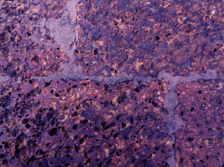 Pop art style purple colored rough old stone floor surface