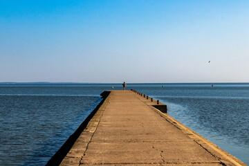 A women in Frombork pier, northern Poland