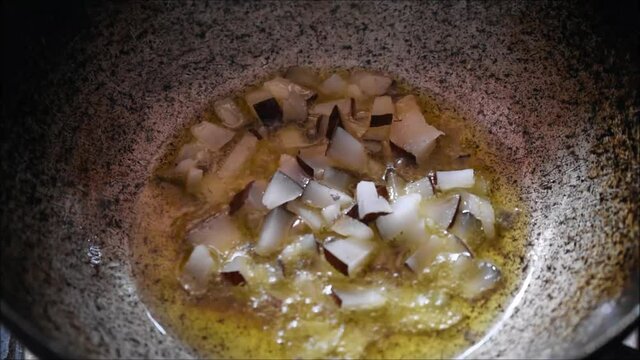 Video of roasting dried coconut in Ghee. It is used for making payasam a south Indian dessert.